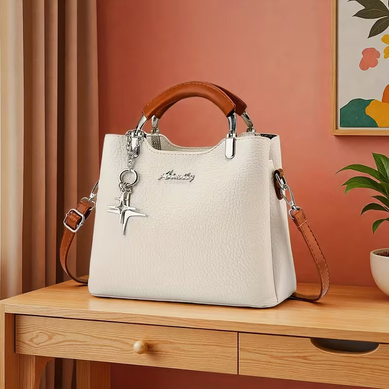 Modern Two-Tone Commuter Satchel – Elegant Top-Handle Handbag with Crossbody Strap & Star Charm