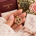 Customer-style close-up of Blooming Initial Heart Necklace with floral crystal details
