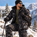 Men’s ArcticGuard fleece-lined two-piece set worn outdoors in snowy mountain conditions
